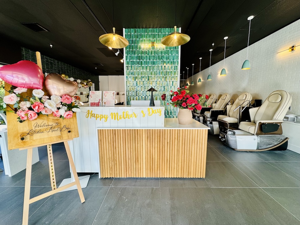 Warm, modern interior of Kitchen Nail Bar Morgan Hill location